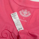 Juicy Couture Bluzka różowa w serek z napisem i koroną