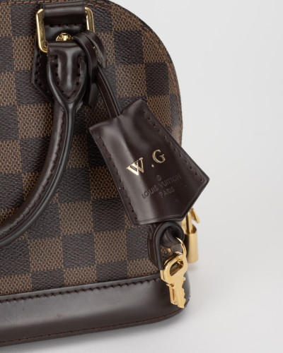 Louis Vuitton Mała torebka alma bb (plamki wewnątrz i hot stampking)